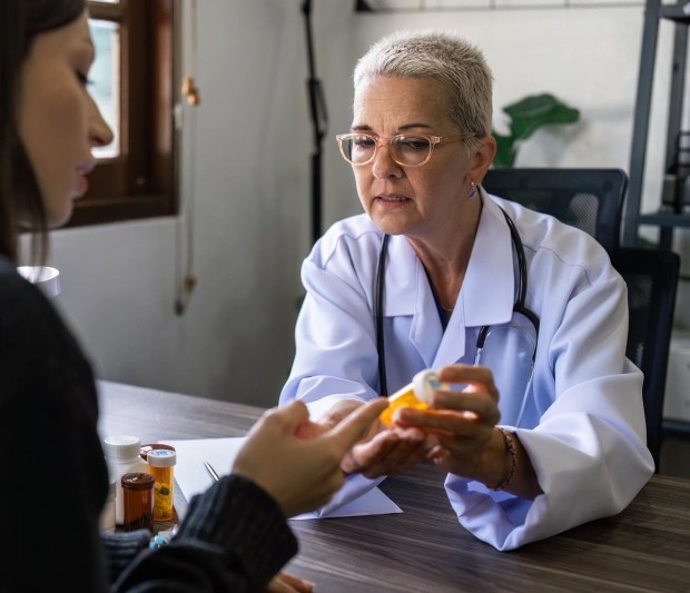 Pharmacist helping individuals and families optimize medications and overall wellness