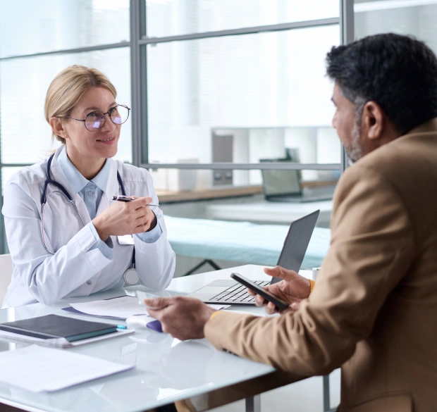 Lifestyle medicine pharmacist meeting with a patient to discuss personalized healthcare solutions